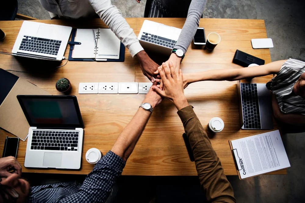 team-business-people-stacking-hands team-business-people-stacking-hands